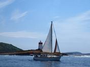 Photo of Club boat Stormfisher passes the Iron Pot.